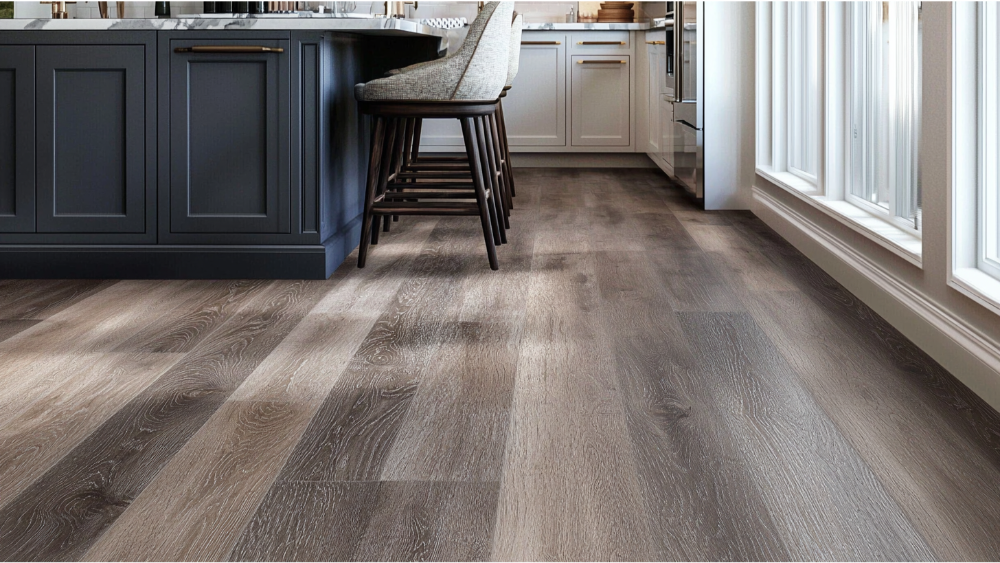 Kitchen with vinyl flooring and bar stools.